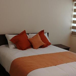 Habitación Estándar con Cama Queen